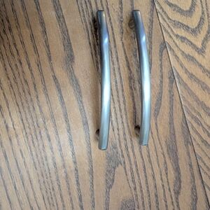 Brushed Silver coloured Cabinet Handles X 7. Couple Post. Curved. Modern Screws.